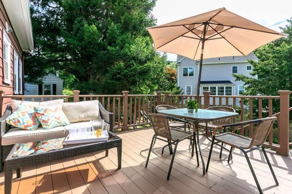 57 Emerson Road Needham, MA 02492 - Photo 18 of 19 a view of a chairs and table in the patio