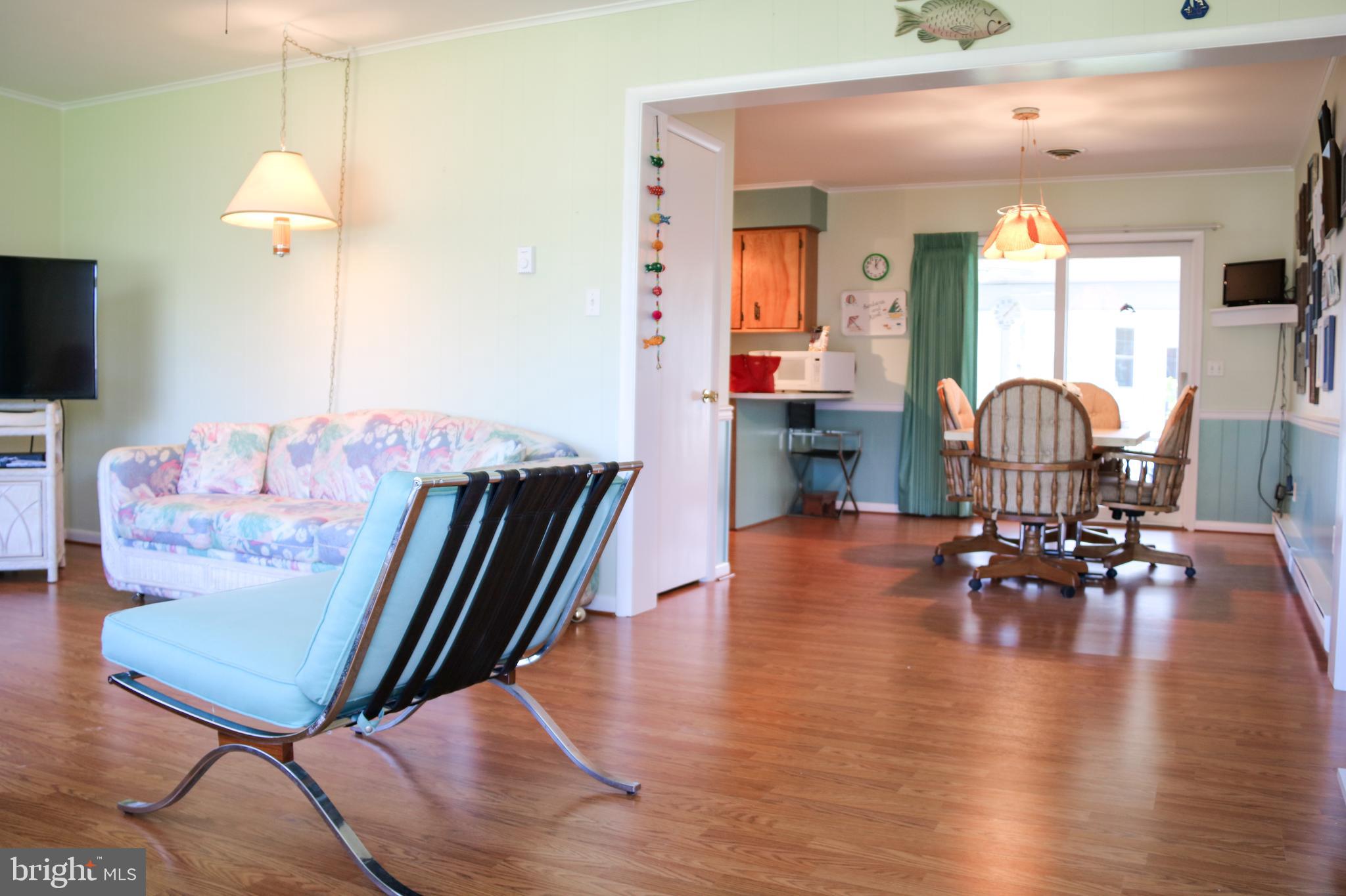 533 Harbor Road Ocean View, DE 19970 - Photo 2 of 31 Entry way through Living area to dining