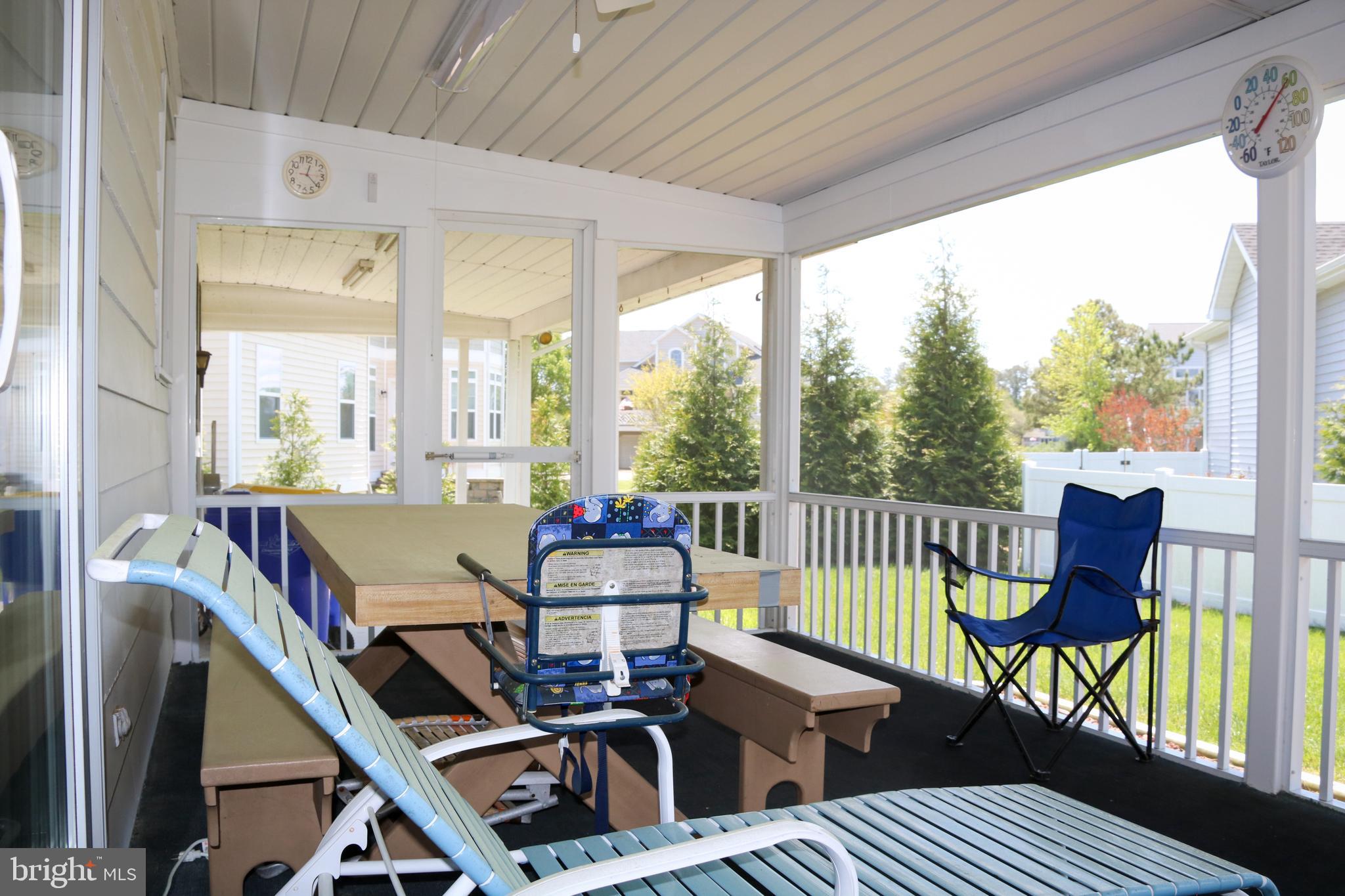 533 Harbor Road Ocean View, DE 19970 - Photo 21 of 31 Large screened in porch