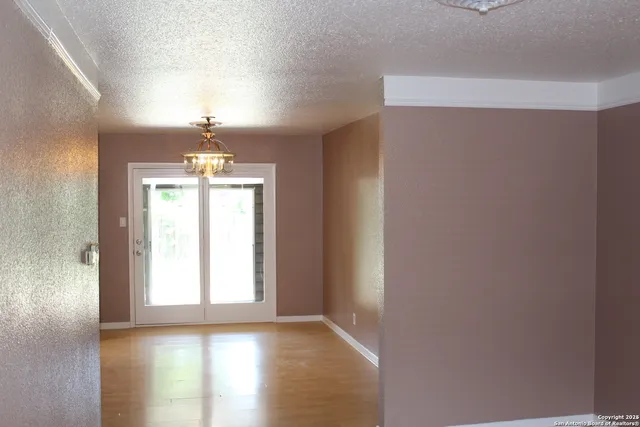 a view of a kitchen with a sink