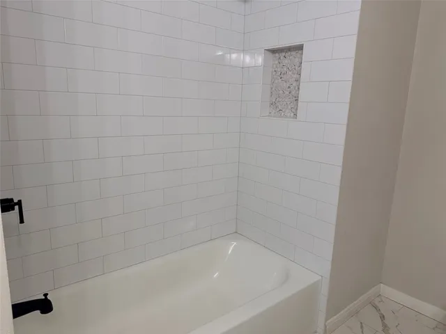 a close up of a bathtub