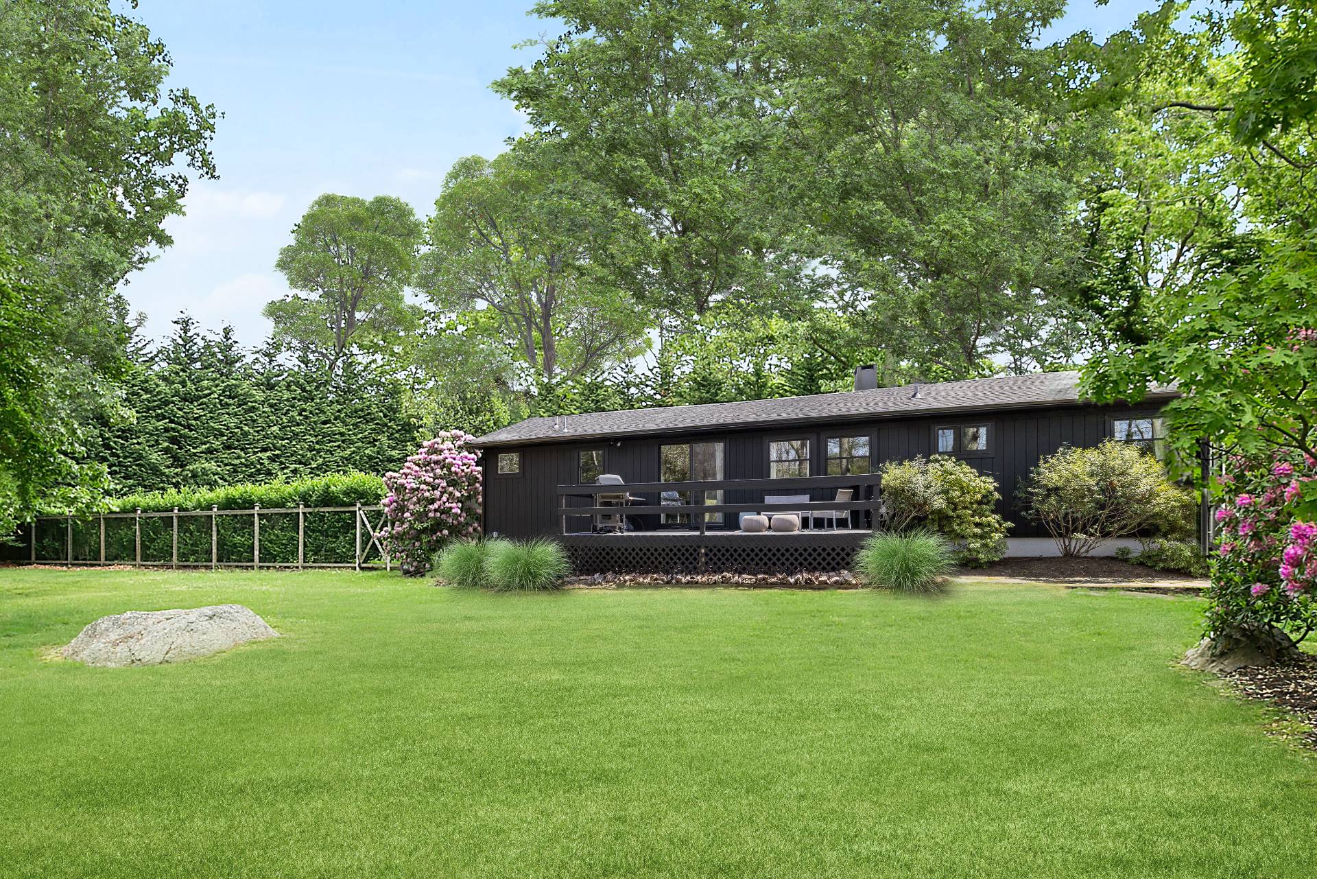 8 Centre Way East Hampton, NY 11937 - Photo 2 of 17 a view of house with backyard and a garden