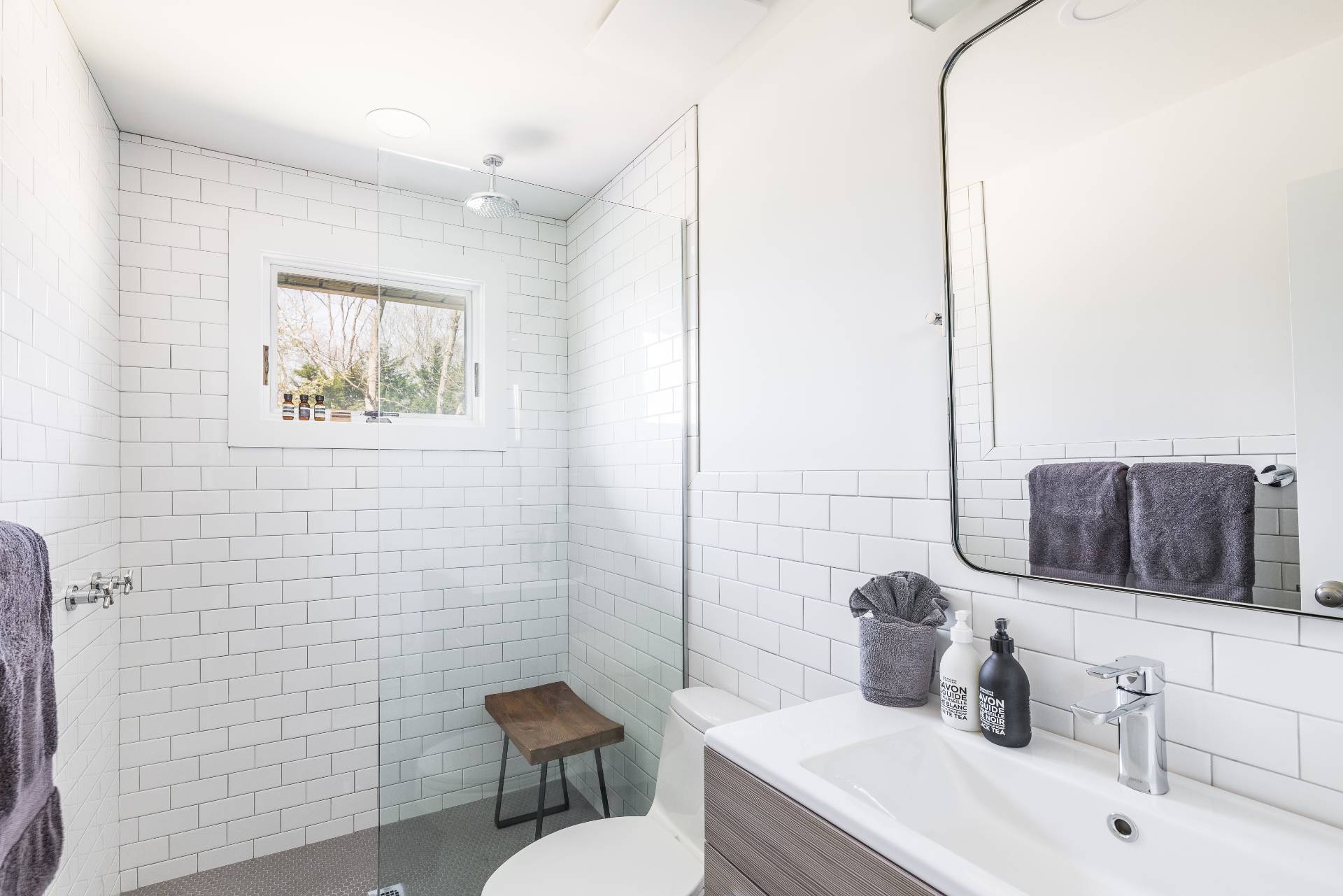 8 Centre Way East Hampton, NY 11937 - Photo 8 of 17 a bathroom with a toilet sink and mirror