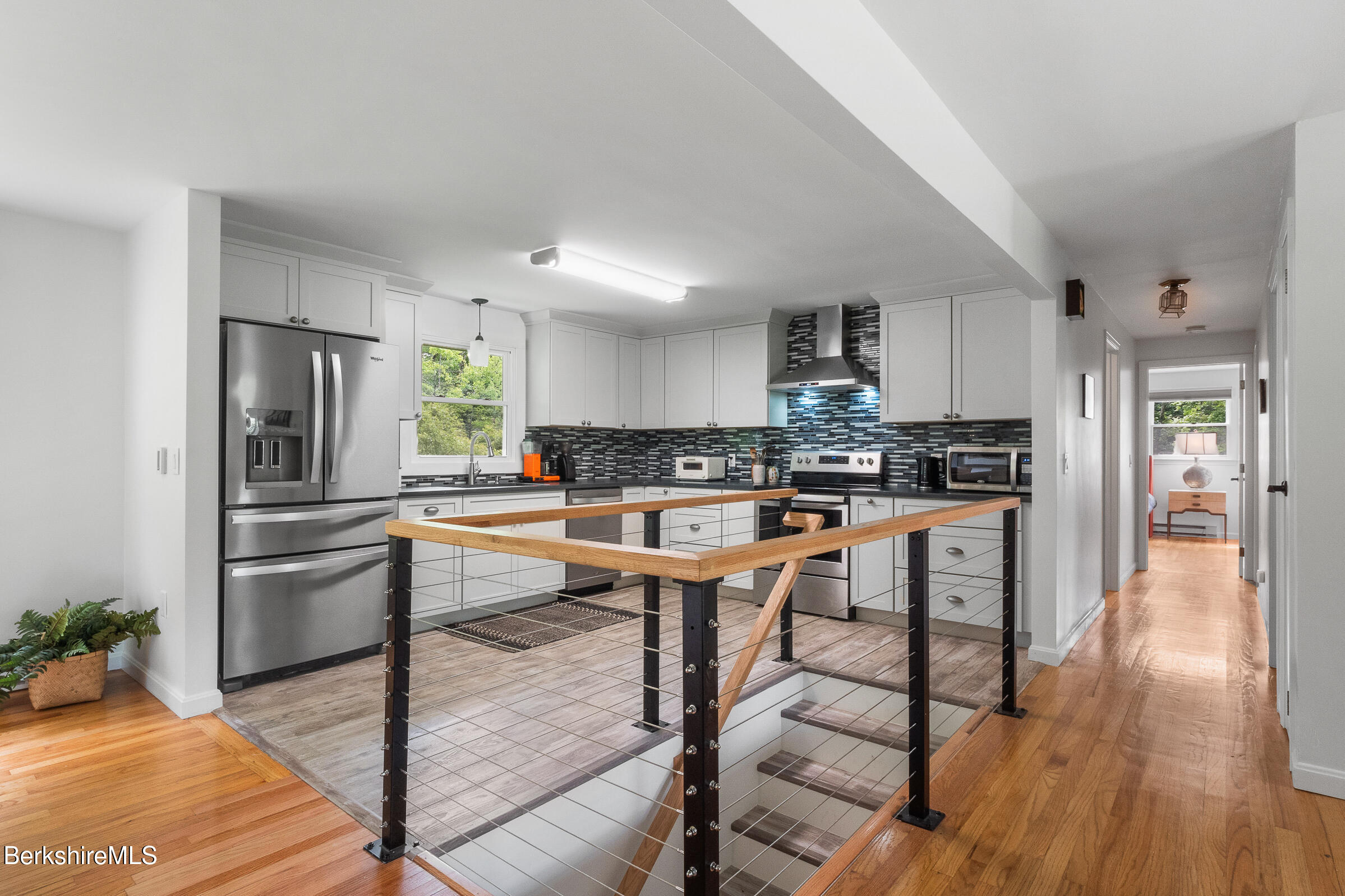 308 Lenox Road Richmond, MA 01254 - Photo 12 of 28 a kitchen with stainless steel appliances granite countertop a refrigerator and a stove top oven