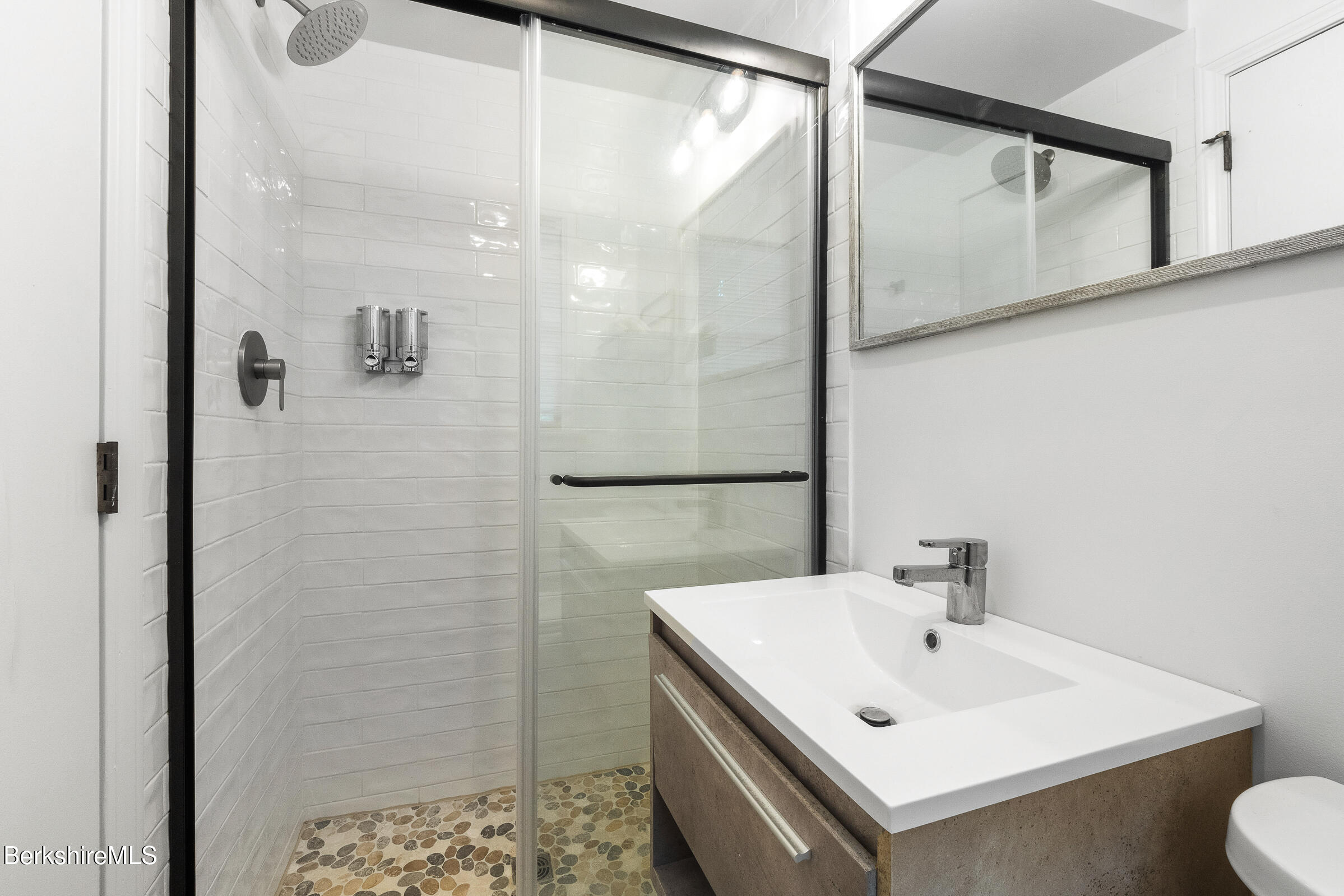 308 Lenox Road Richmond, MA 01254 - Photo 18 of 28 a bathroom with a sink and mirror