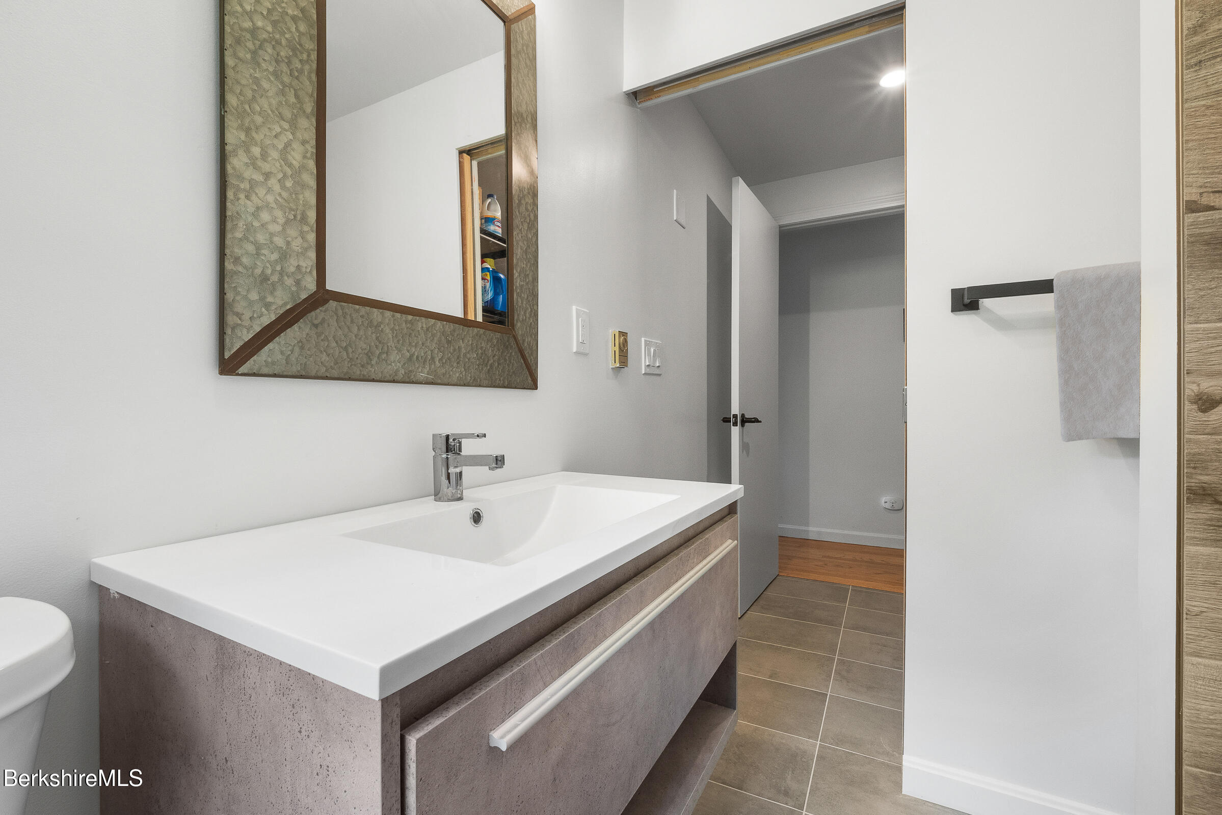 308 Lenox Road Richmond, MA 01254 - Photo 21 of 28 a bathroom with a sink and a mirror