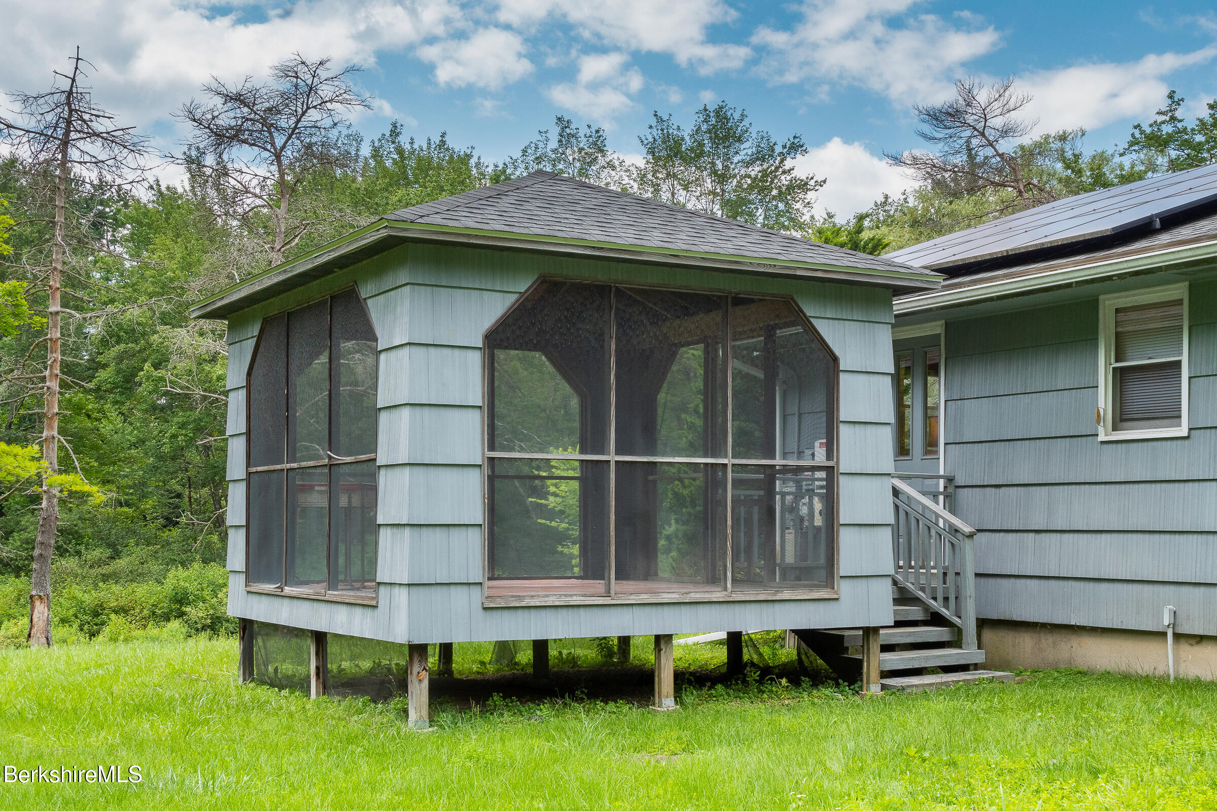 308 Lenox Road Richmond, MA 01254 - Photo 24 of 28 a small pool with a outdoor seating area