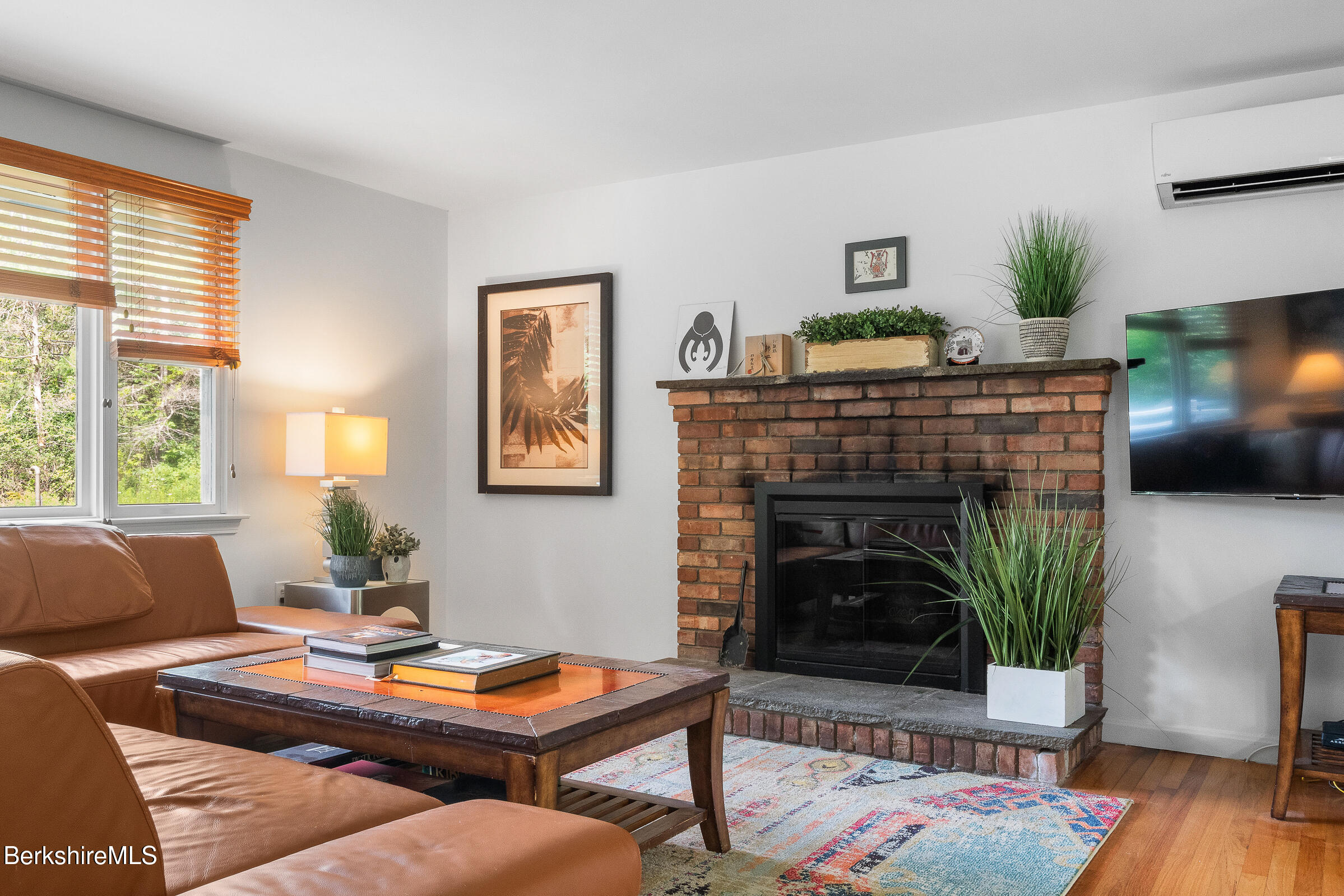 308 Lenox Road Richmond, MA 01254 - Photo 7 of 28 a living room with furniture and a fireplace