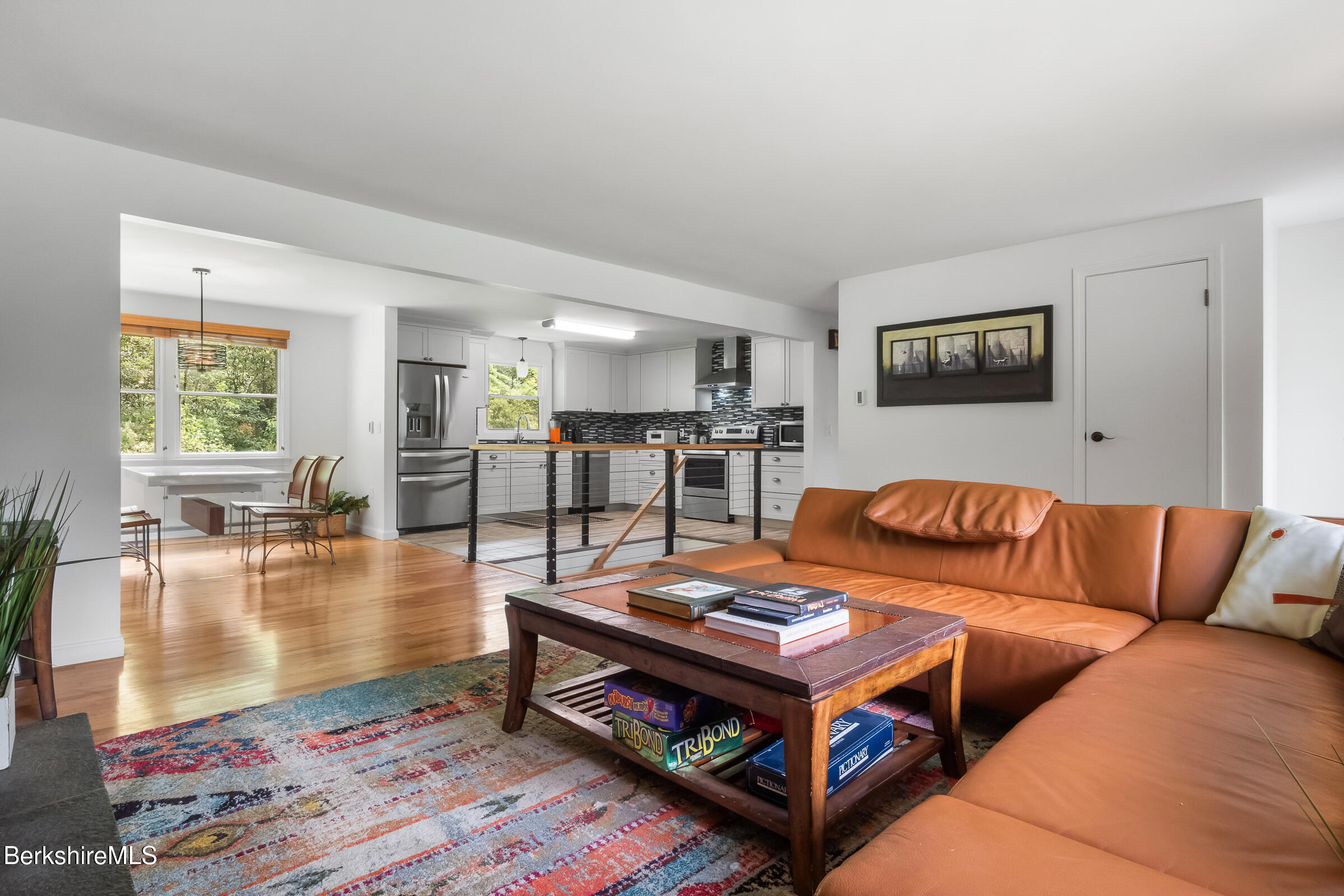 308 Lenox Road Richmond, MA 01254 - Photo 9 of 28 a living room with furniture and a table