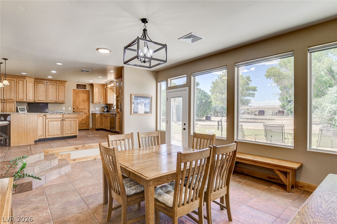 1950 Bowman Road Logandale, NV 89021 - Photo 20 of 81 A spacious dining area with views of the natural surroundings.