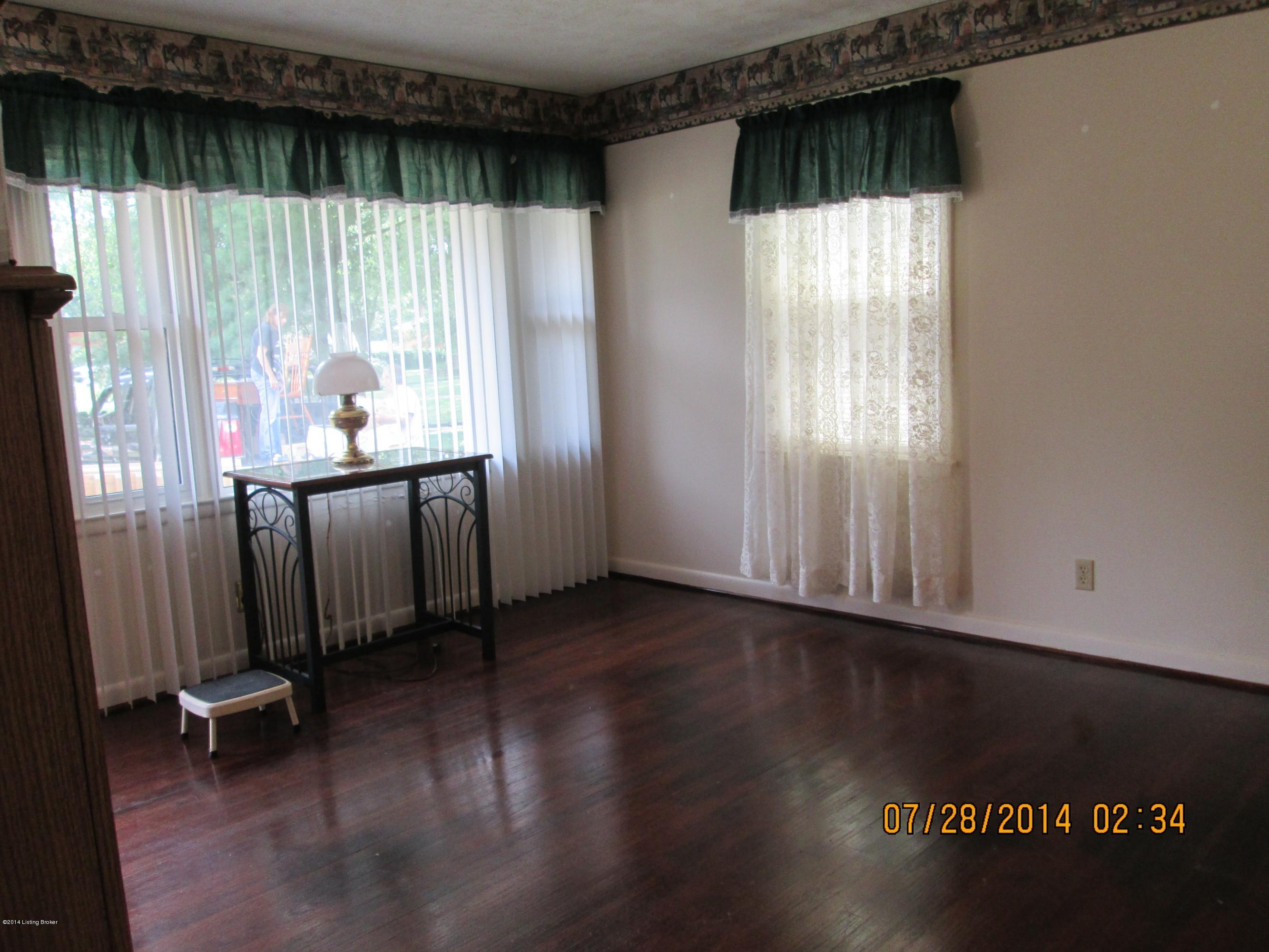 1324 Gallant Fox Run Road Louisville, KY 40242 - Photo 3 of 17 Living Room, lots of sun light, hardwood