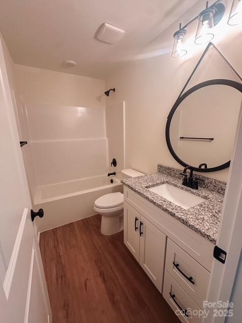 720 McLarty Street Monroe, NC 28112 - Photo 10 of 14 a bathroom with a granite countertop sink mirror vanity and toilet