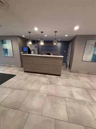 a picture of a bathroom with mirror