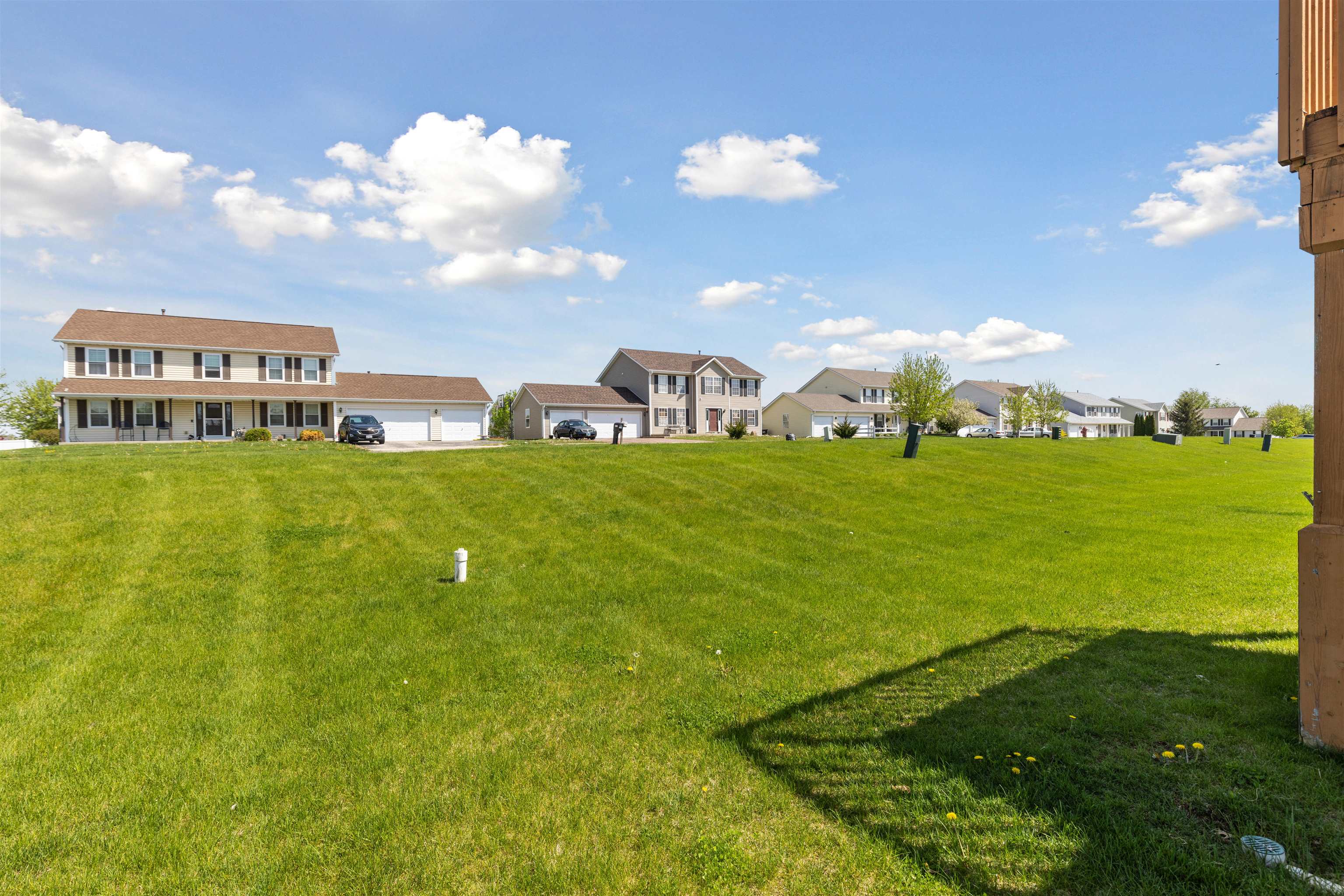 12000 Primrose Place Poplar Grove, IL 61065 - Photo 14 of 15 a view of a big yard with table and chairs