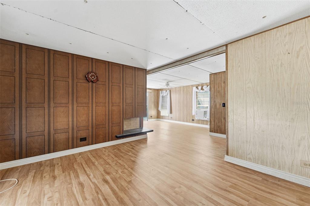 19 Mary Bell Landing Road Sebring, FL 33876 - Photo 3 of 22 a view of an empty room with wooden floor