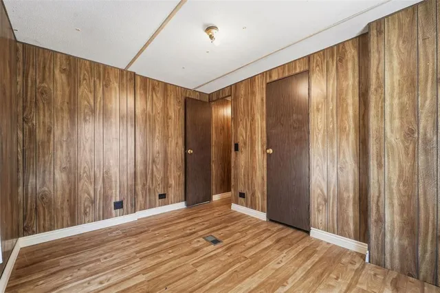 a view of a livingroom with wooden floor