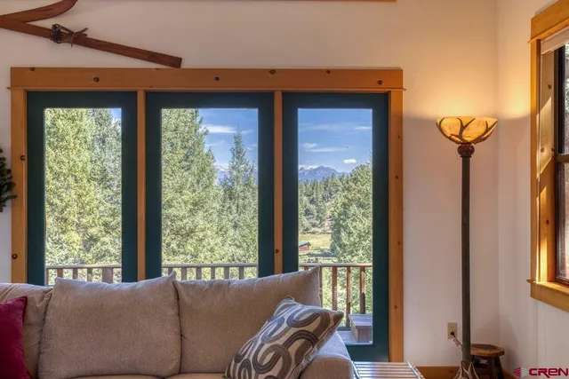 a living room with large window