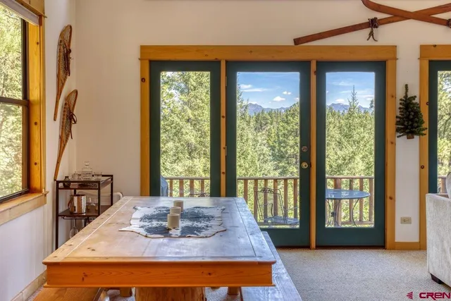 a kitchen with kitchen island granite countertop a sink stainless steel appliances and cabinets