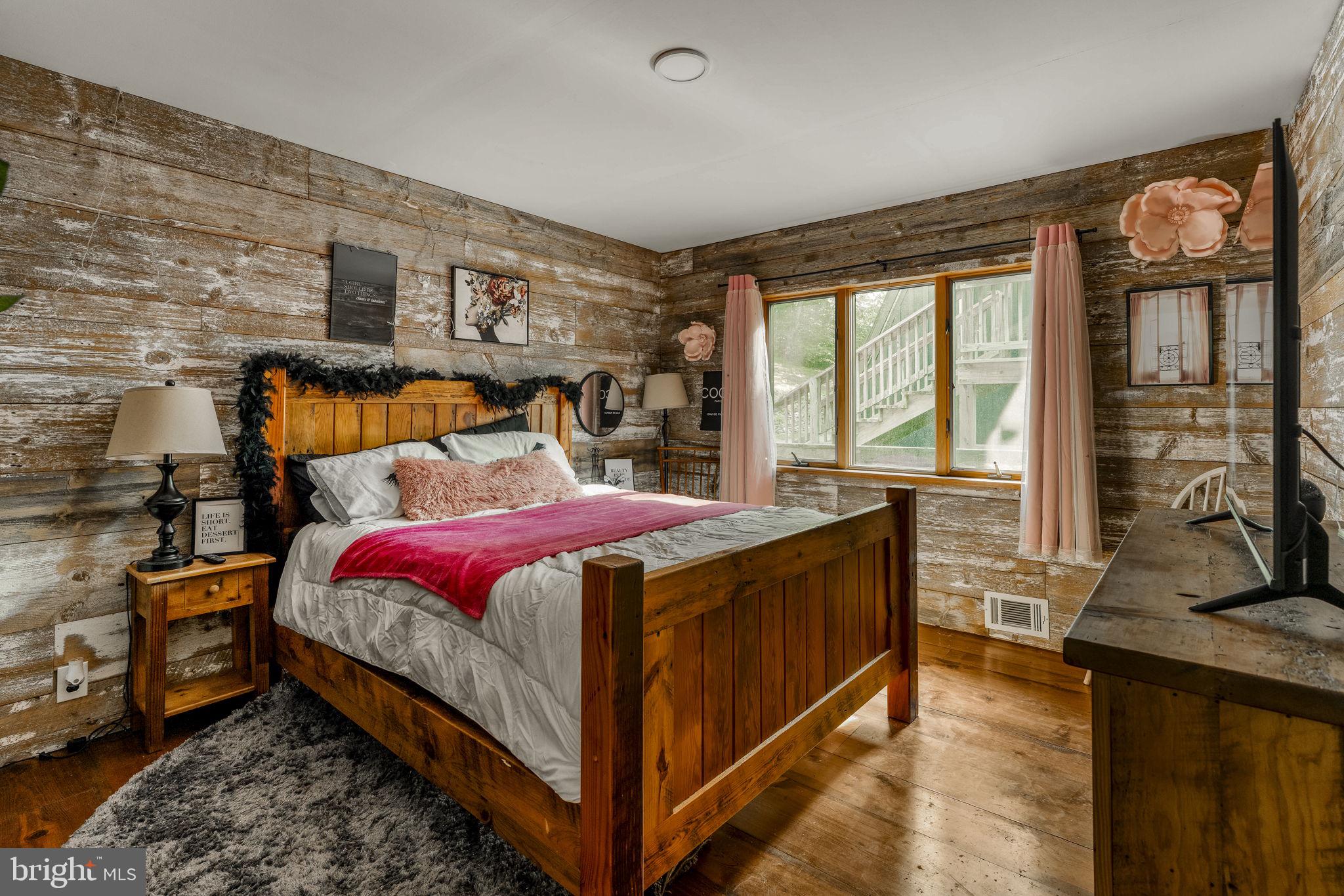160 Fairview Road Kirkwood, PA 17536 - Photo 22 of 81 a bedroom with a bed and large windows