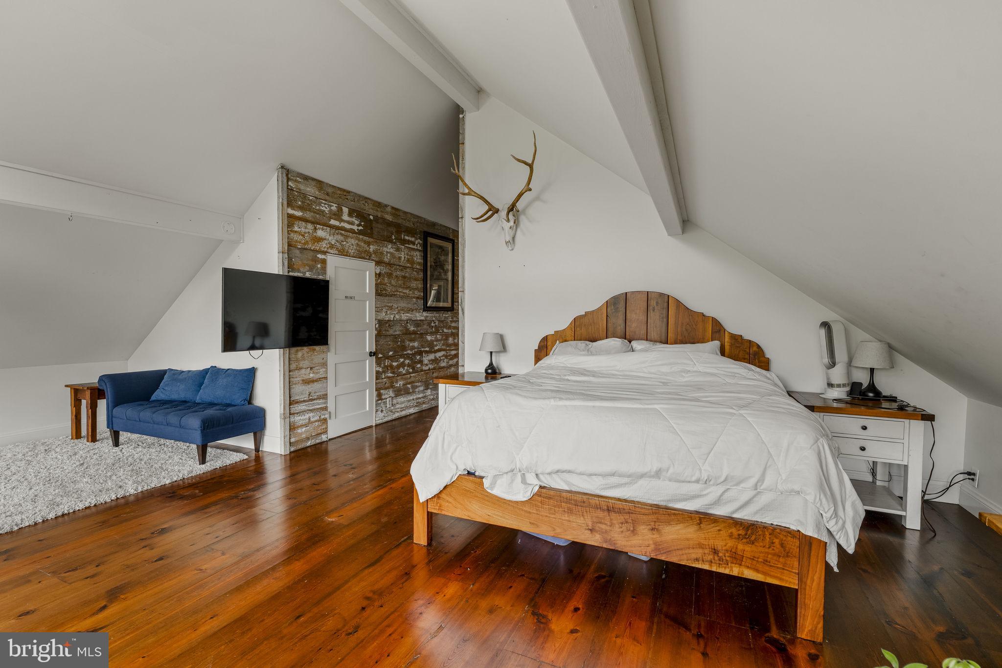160 Fairview Road Kirkwood, PA 17536 - Photo 28 of 81 a bedroom with a bed and wooden floor