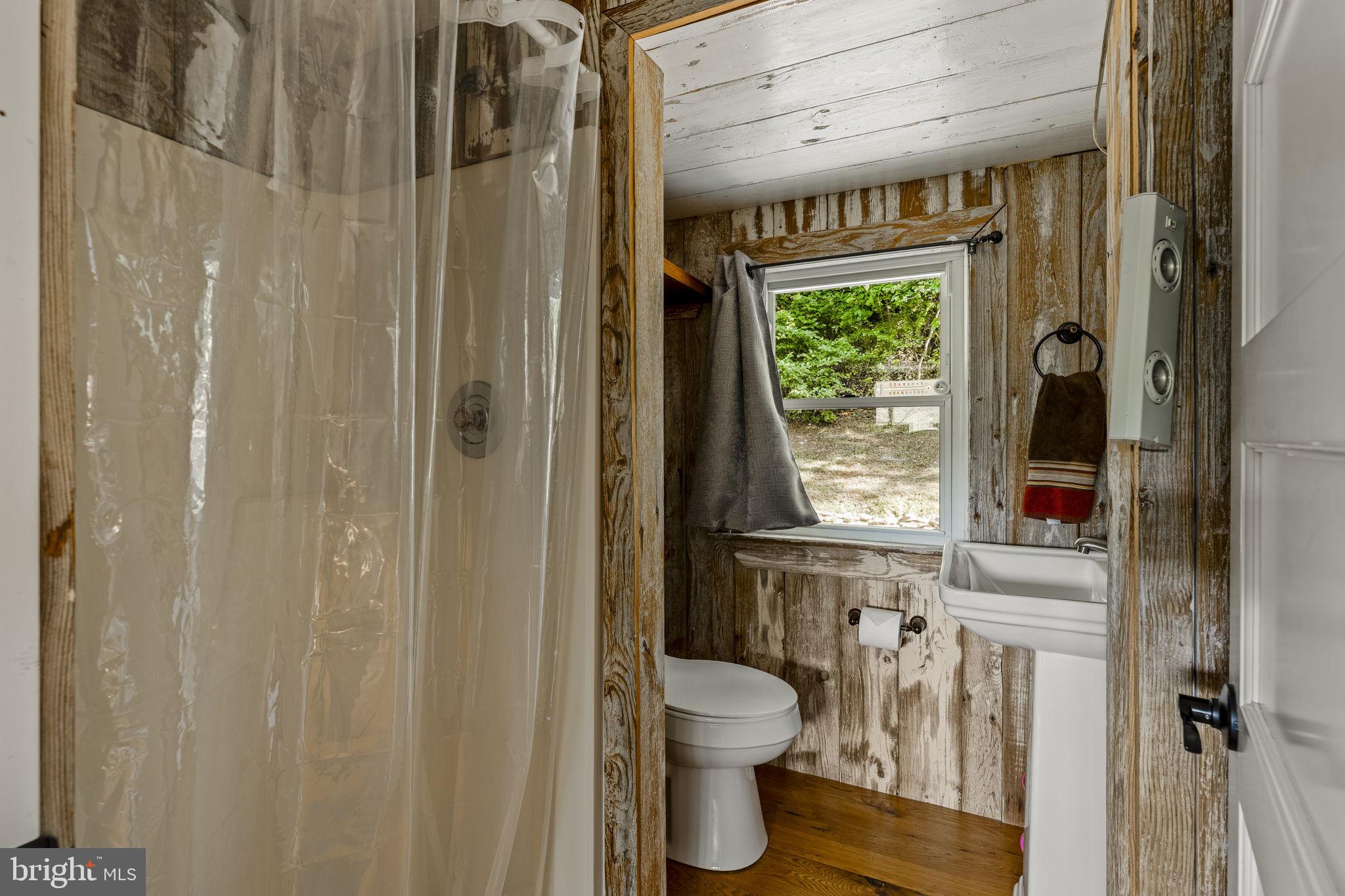 160 Fairview Road Kirkwood, PA 17536 - Photo 50 of 81 a bathroom with a toilet a sink and a window