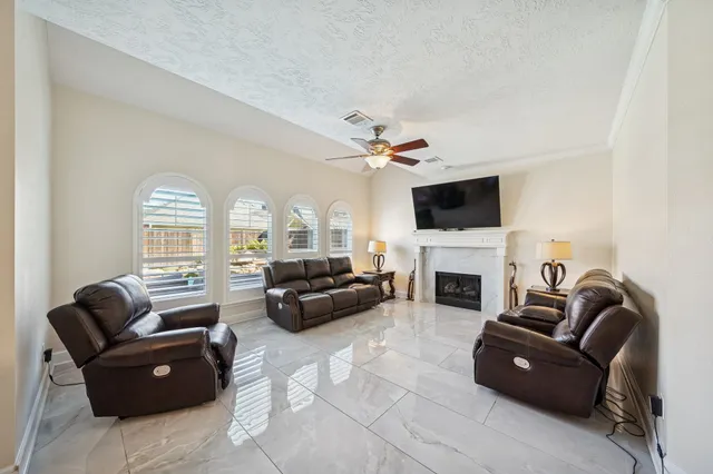 a kitchen with stainless steel appliances granite countertop a stove and a sink