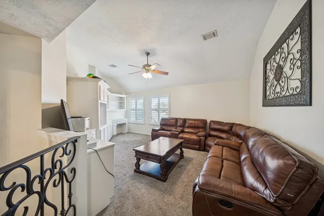 a view of a chairs and table in the patio