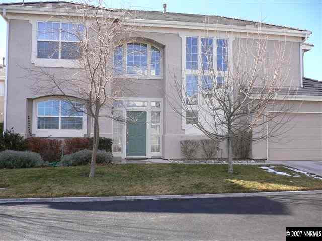 9629 Truckee Meadows Place Reno, NV 89521 - Photo 1 of 8 a view of a house with a yard