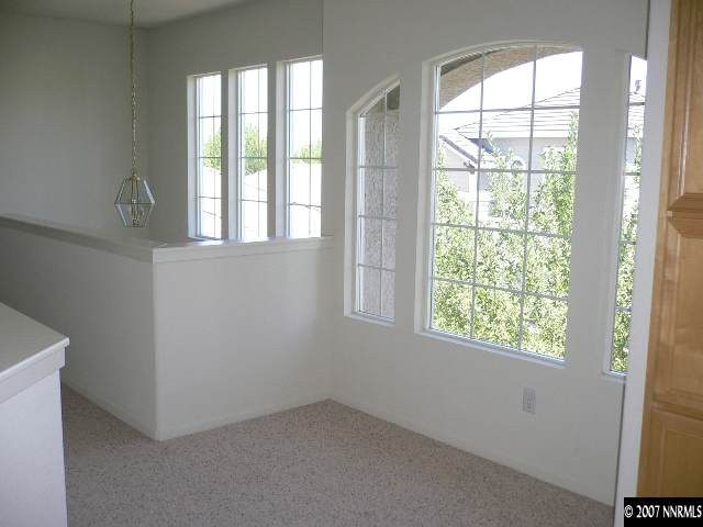 9629 Truckee Meadows Place Reno, NV 89521 - Photo 7 of 8 an empty room with a window