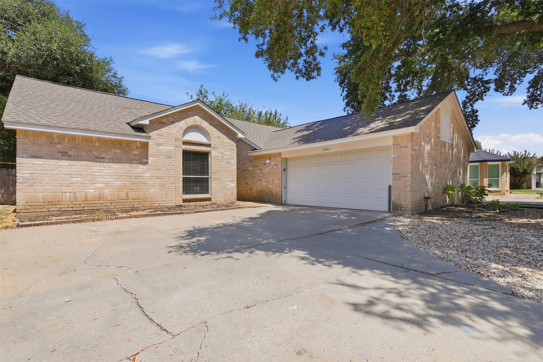 2323 Piddler Drive Spring, TX 77373 - Photo 2 of 21 Charming ONE story with a 2-car attached garage!