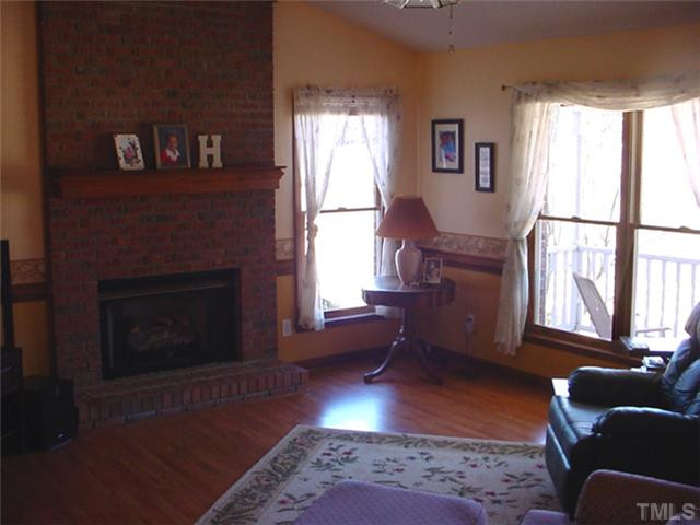 952 Old Sanders Road Smithfield, NC 27577 - Photo 3 of 17 Living Room with Gas Log Fireplace