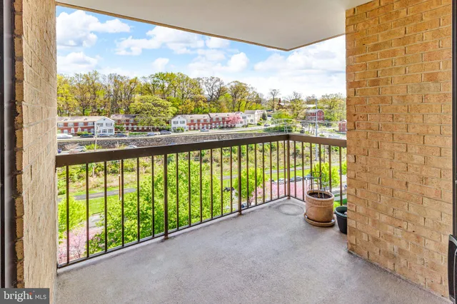 a bathroom with a tub and shower