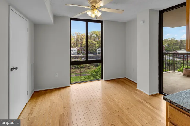 a view of a kitchen from the hallway