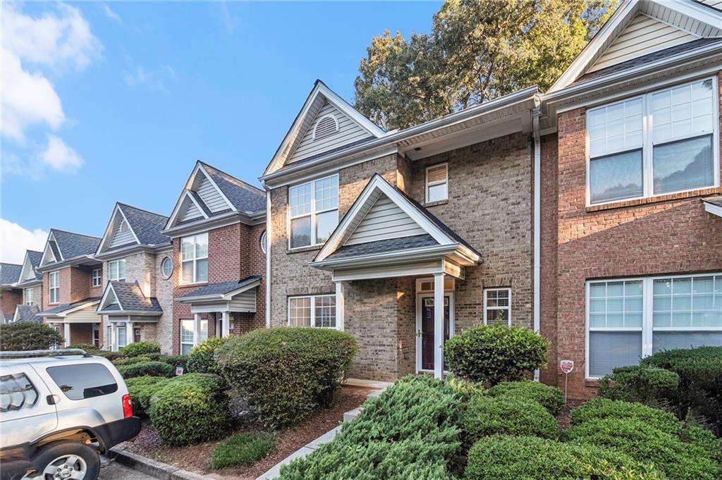 3864 Austin Park Lane Decatur, GA 30032 - Photo 1 of 1 a front view of a house with a yard