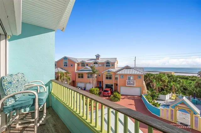 a view of a balcony with an outdoor space