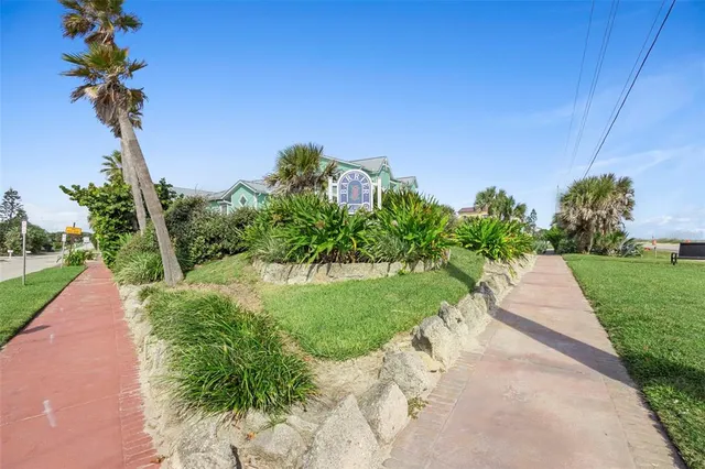 a view of a garden with a pathway