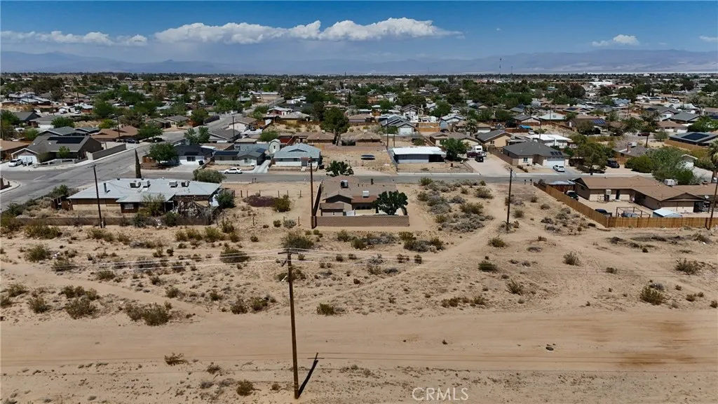 744 West Bowman Road Ridgecrest, CA 93555 - Photo 6 of 9 Red boundary lines on pictures are an estimate and for marketing purposes only. Buyer to verify all aspects of this property including, but not limited to utilities, assessments, boundaries, usage, access, and zoning to satisfy themselves.