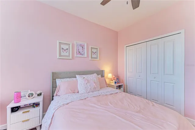 a bedroom with furniture and a window