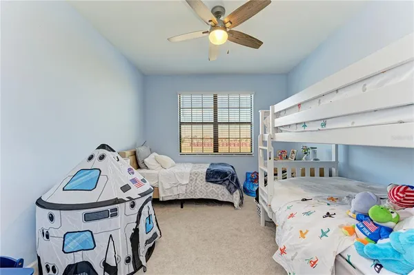 a bedroom with a bed and a closet