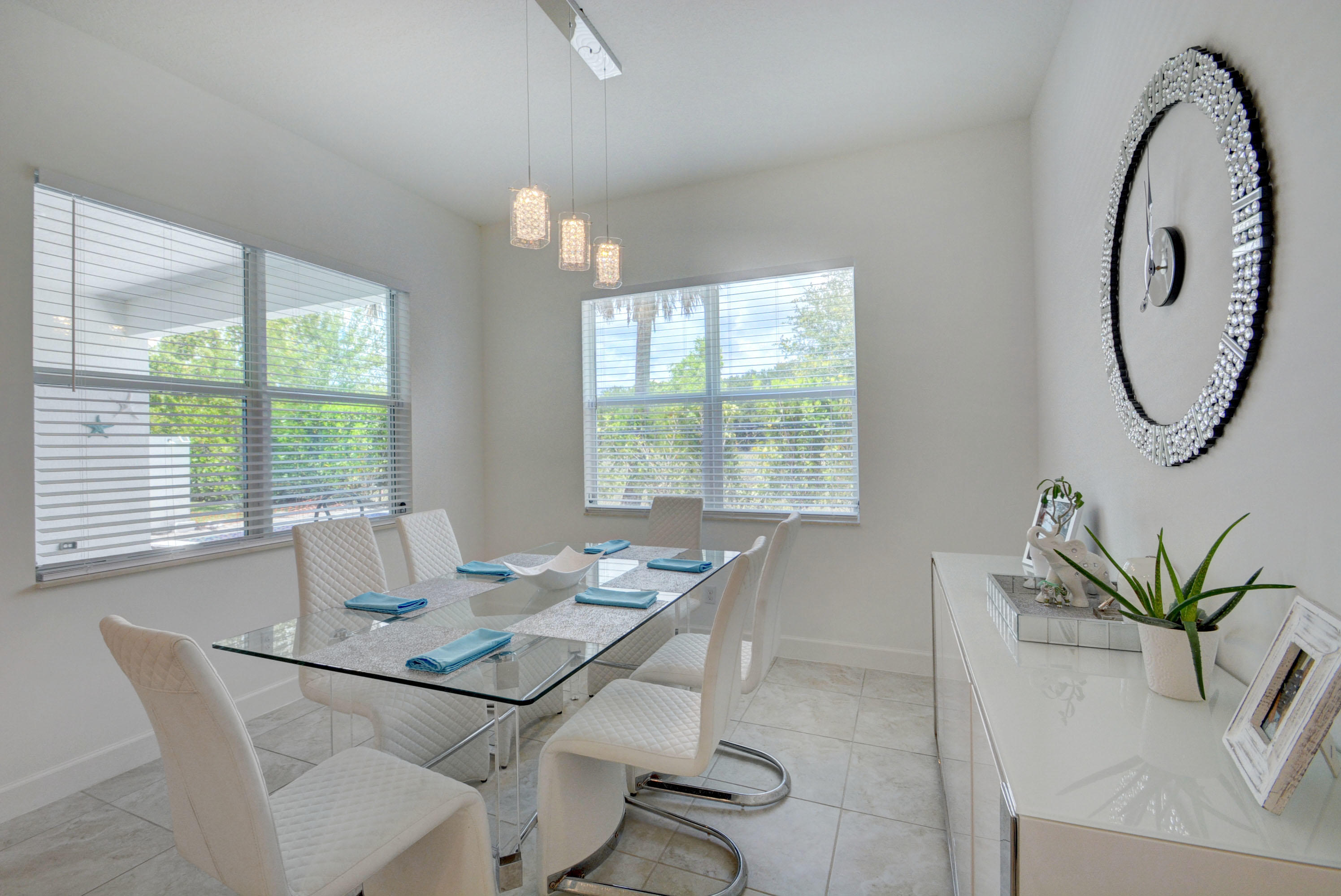 5251 Beland Drive Lake Worth, FL 33467 - Photo 22 of 56 a view of a dining room with furniture window and outside view