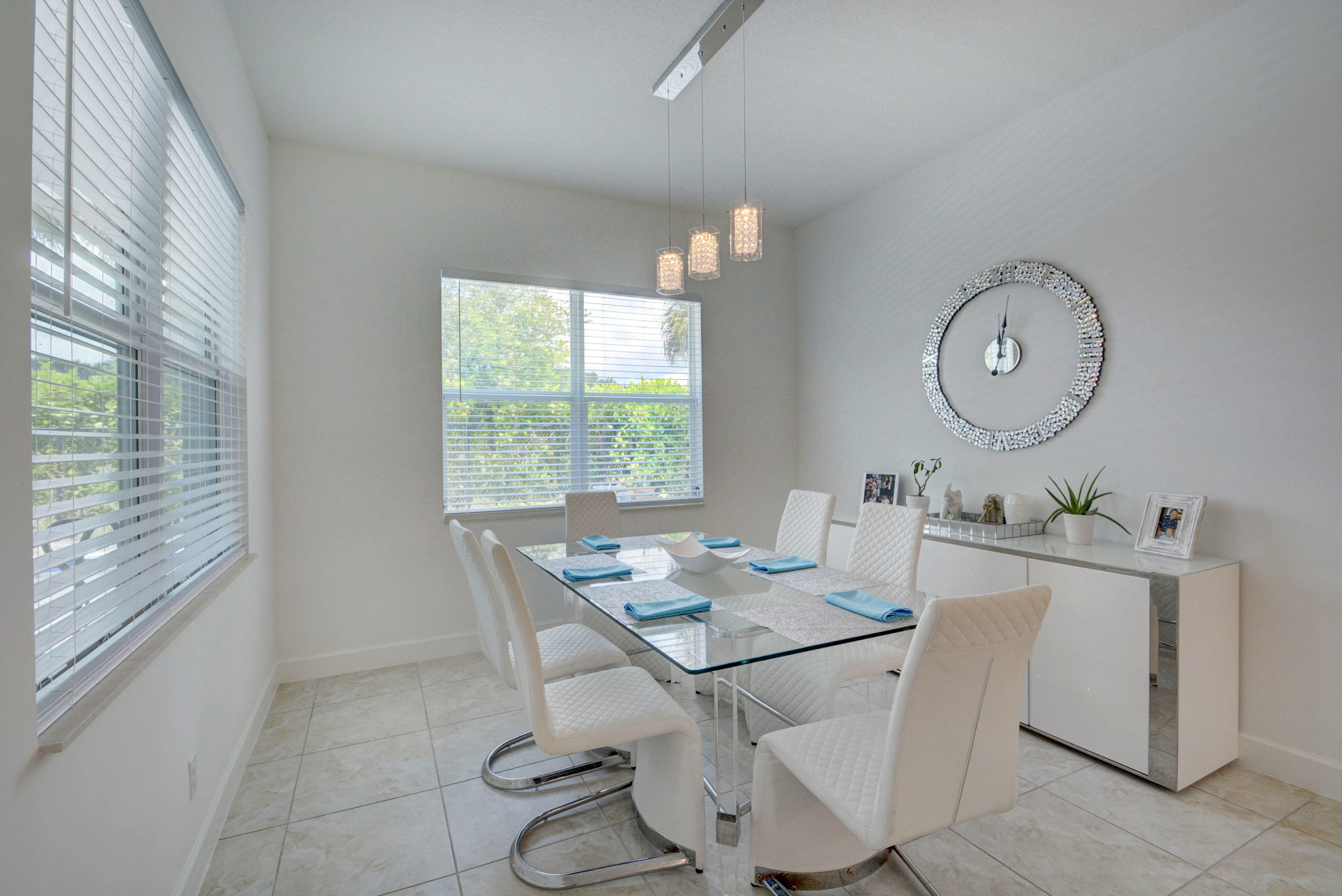 5251 Beland Drive Lake Worth, FL 33467 - Photo 23 of 56 a view of a dining room with furniture window and wooden floor