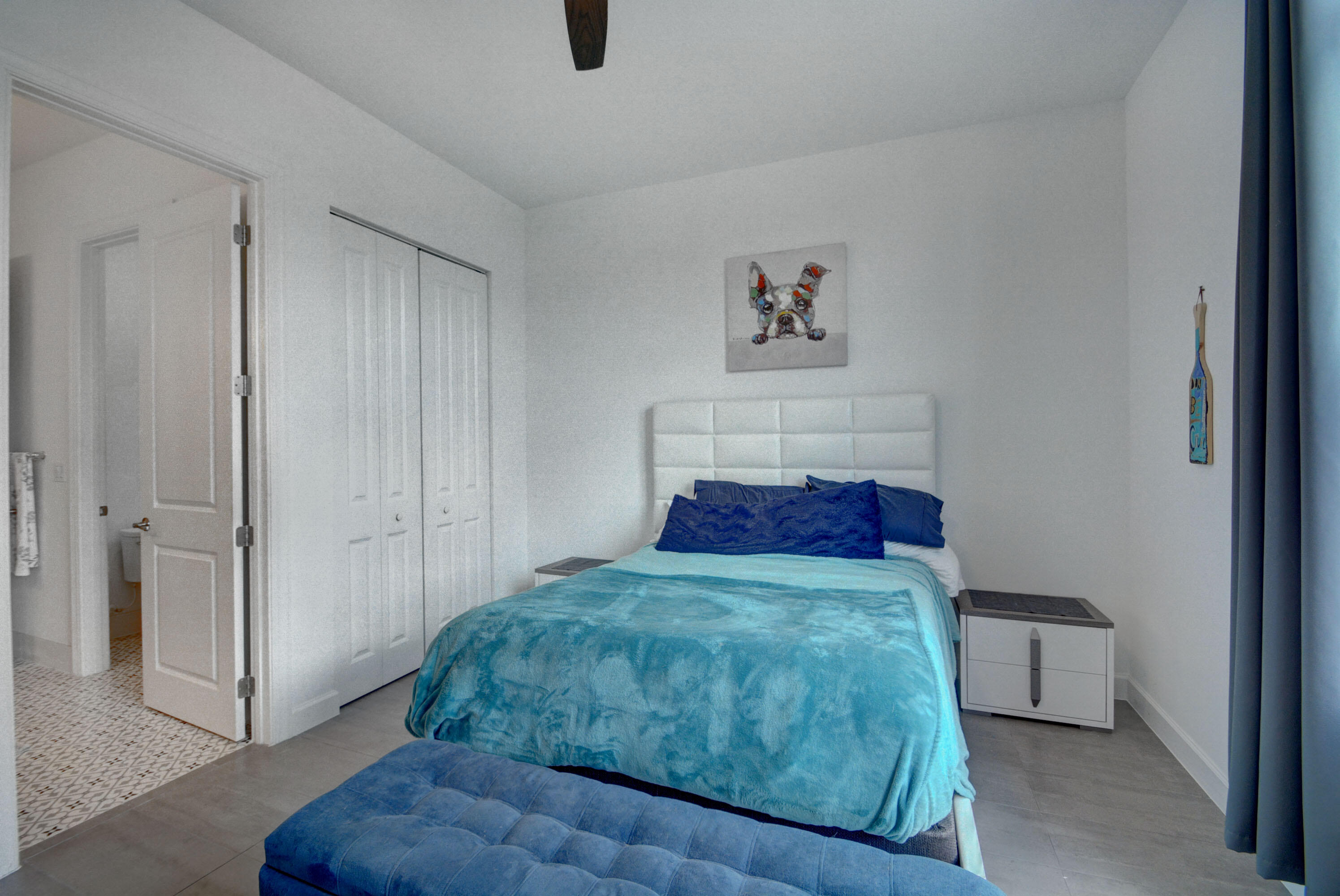 5251 Beland Drive Lake Worth, FL 33467 - Photo 41 of 56 a bedroom with a bed and a window