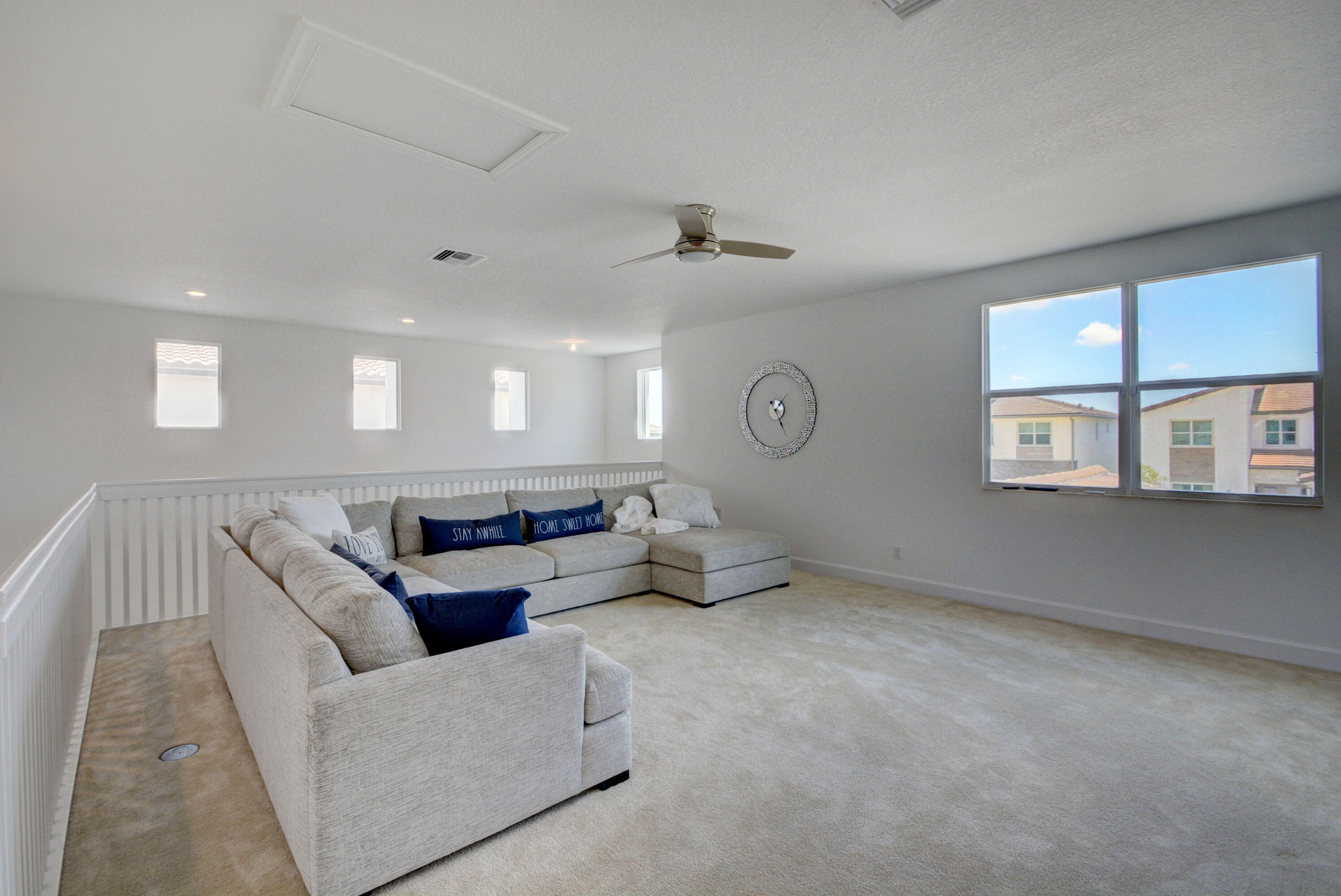 5251 Beland Drive Lake Worth, FL 33467 - Photo 48 of 56 a living room with furniture and a window