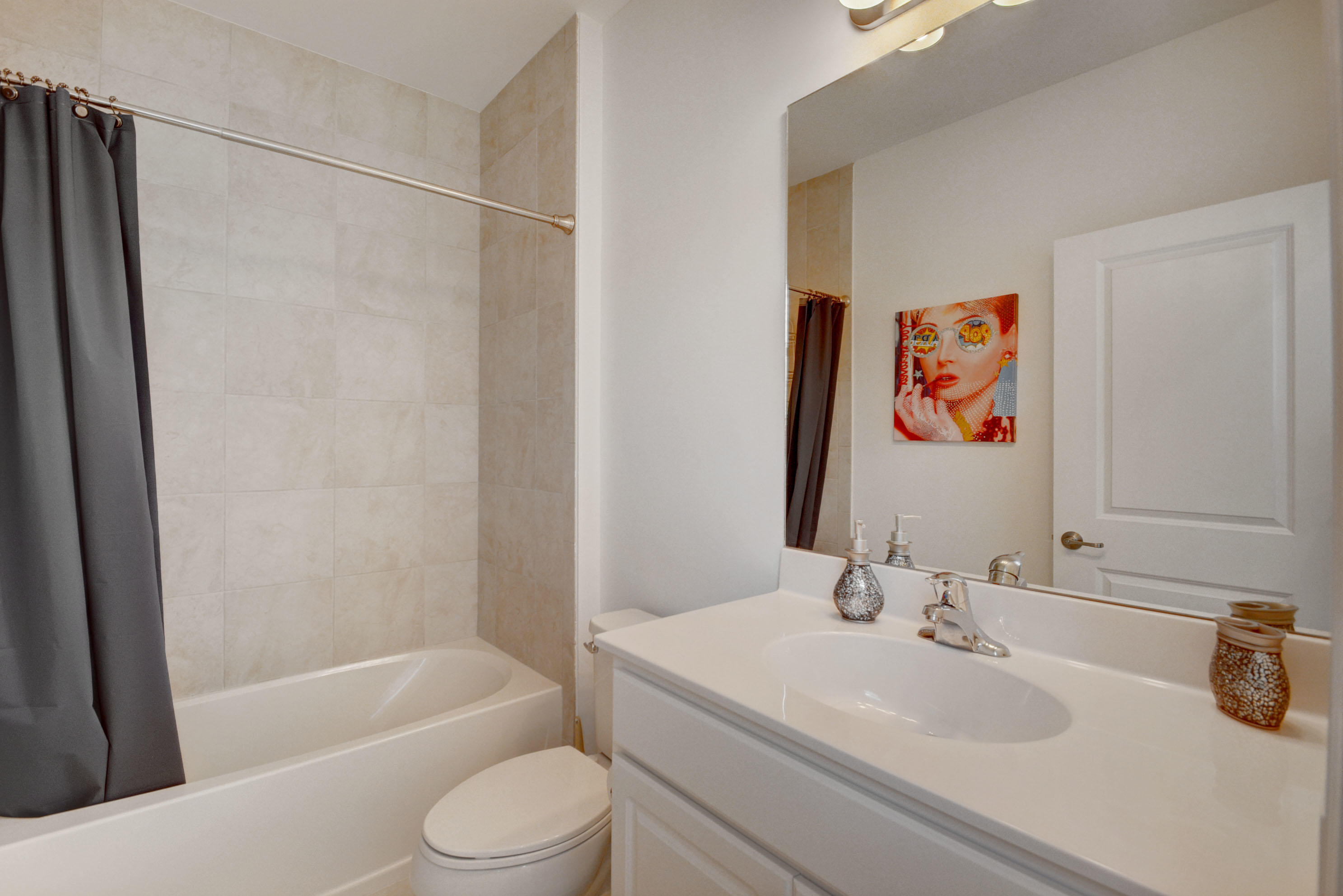 5251 Beland Drive Lake Worth, FL 33467 - Photo 51 of 56 a bathroom with a sink a toilet and a bathtub
