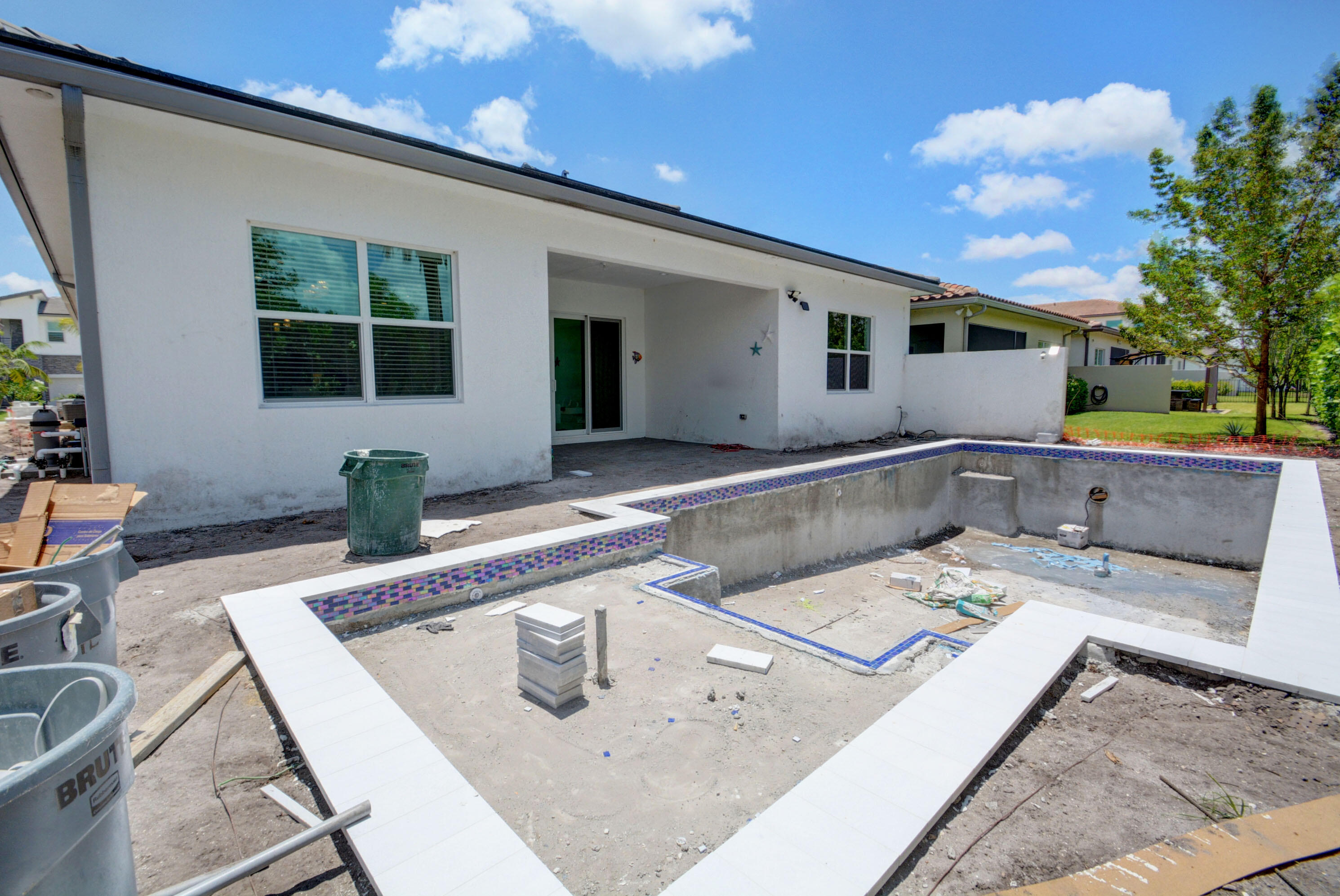 5251 Beland Drive Lake Worth, FL 33467 - Photo 54 of 56 a view of a kitchen with a sink and living room