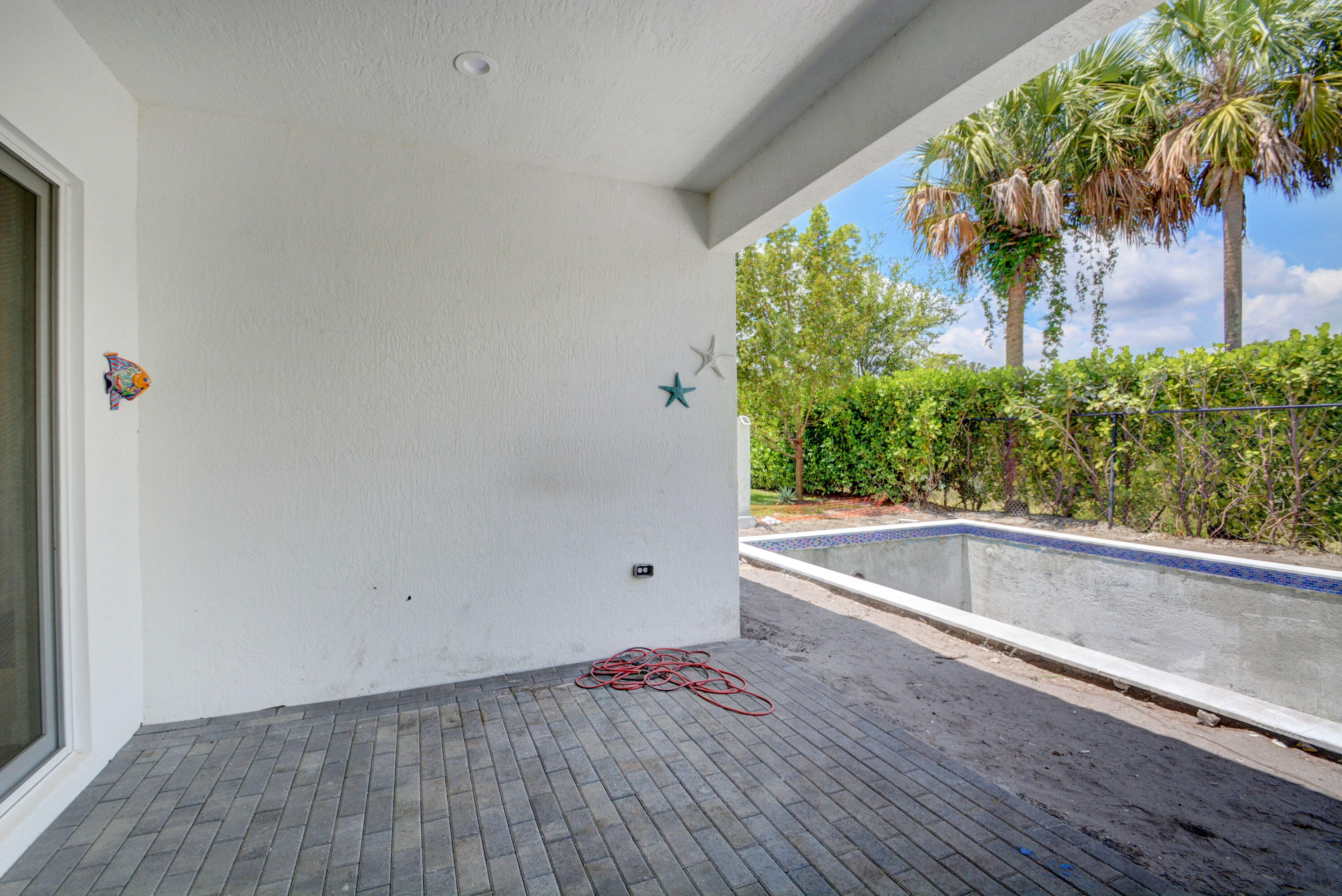 5251 Beland Drive Lake Worth, FL 33467 - Photo 55 of 56 a view of outdoor space with wooden floor and windows