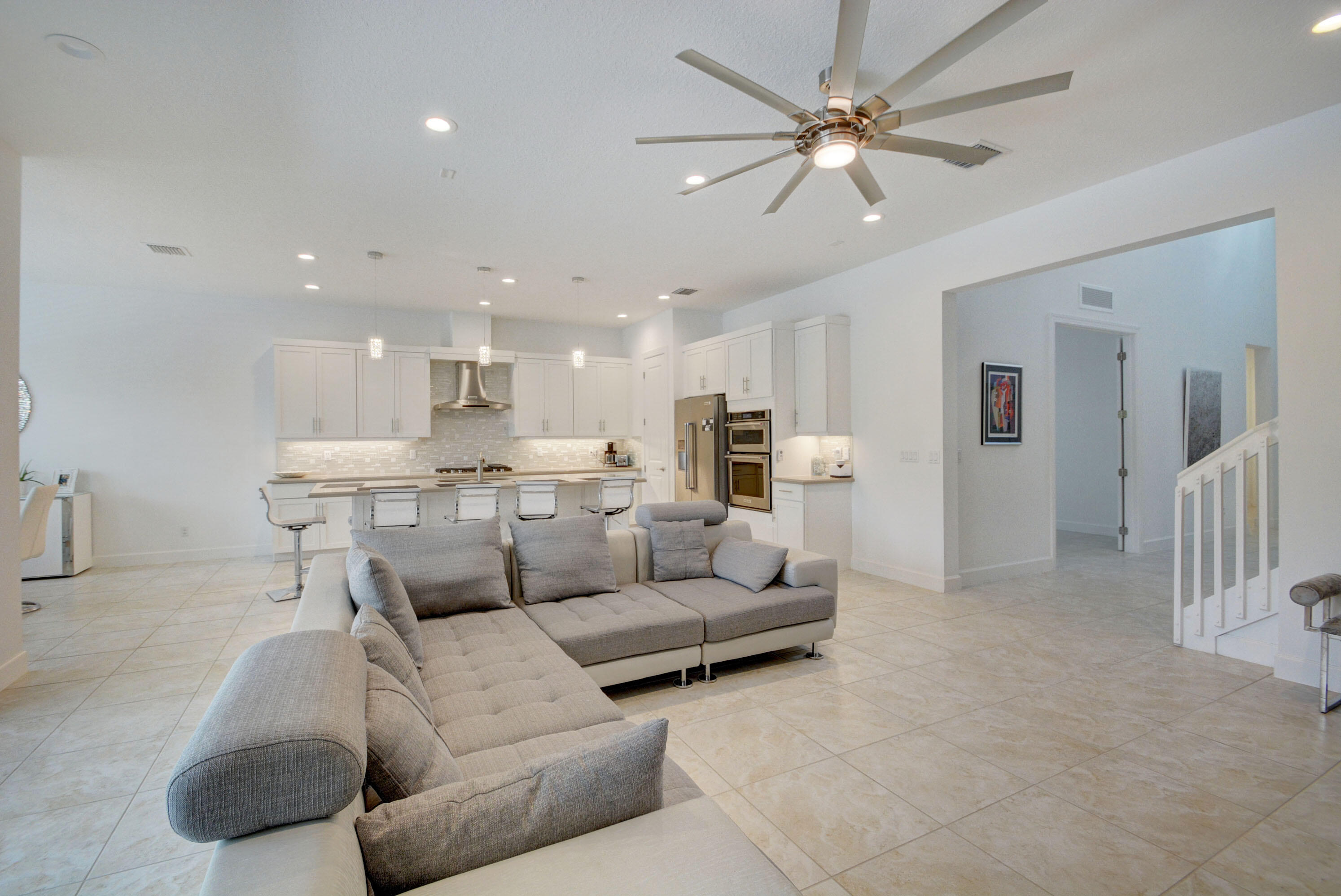 5251 Beland Drive Lake Worth, FL 33467 - Photo 10 of 56 a living room with furniture and a view of kitchen
