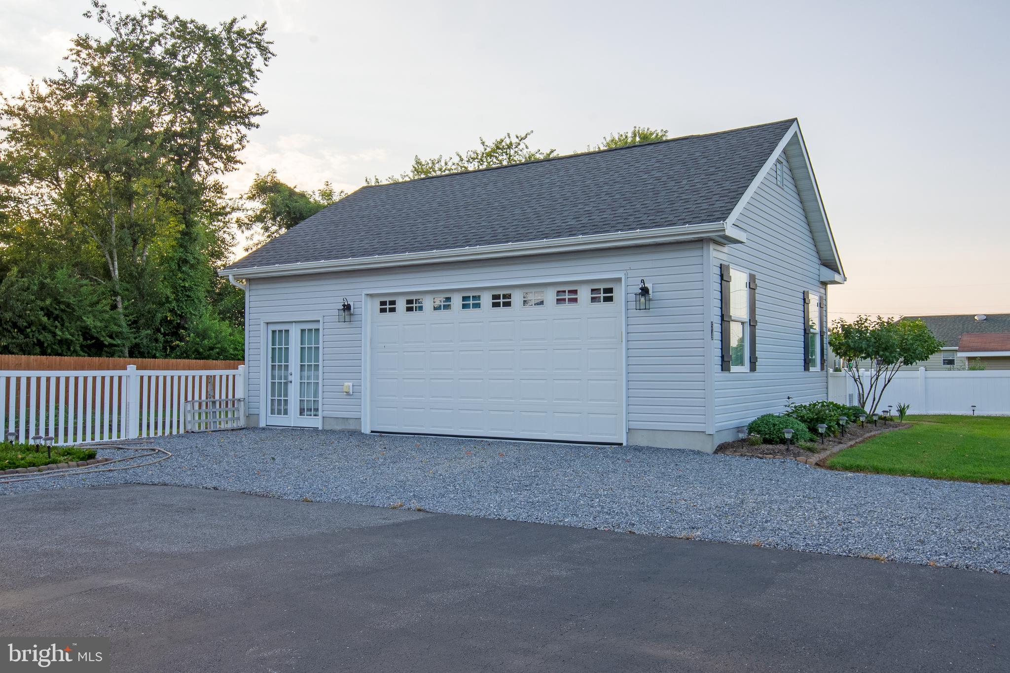 54 Minner Street Houston, DE 19954 - Photo 13 of 55 a house with a outdoor space
