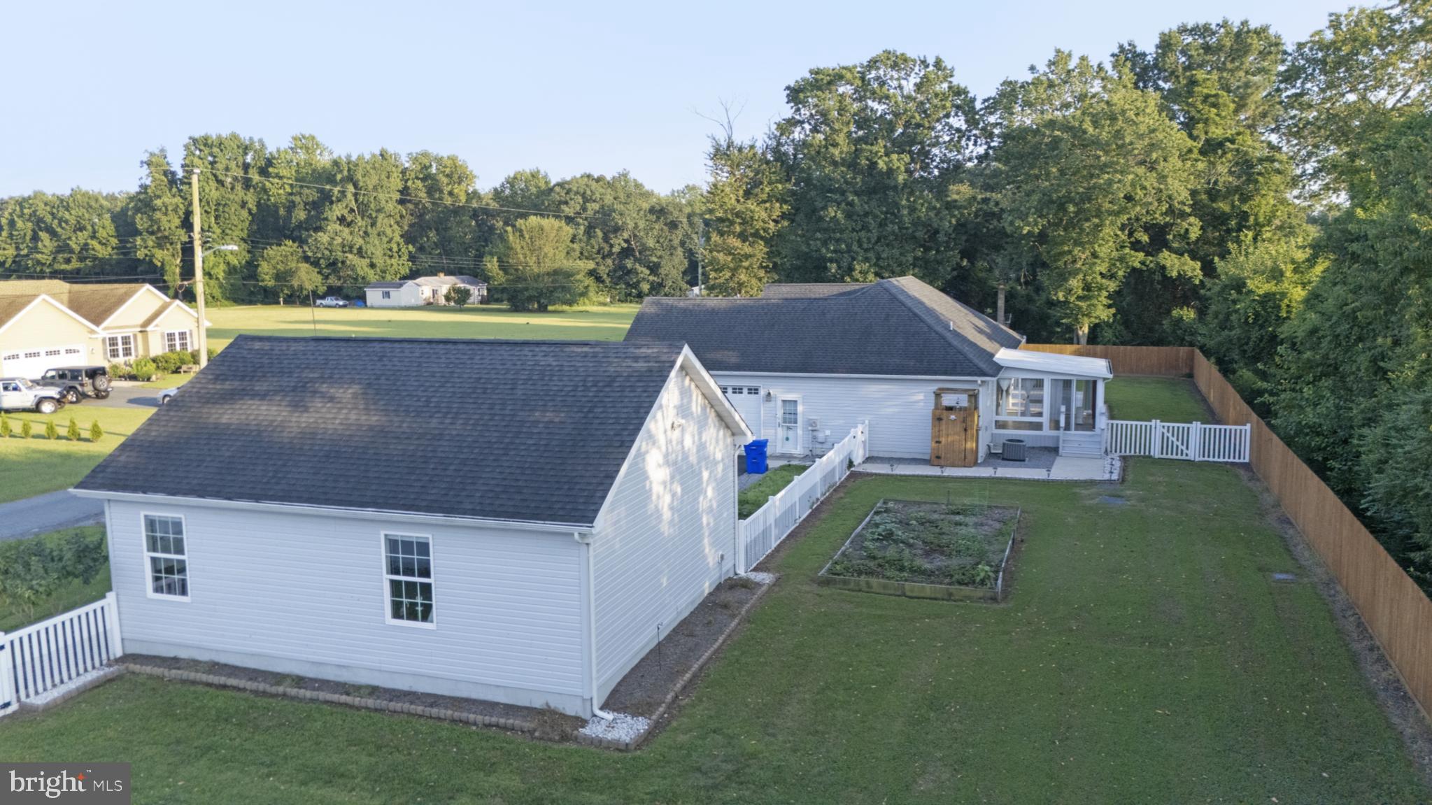 54 Minner Street Houston, DE 19954 - Photo 14 of 55 a aerial view of a house next to a yard