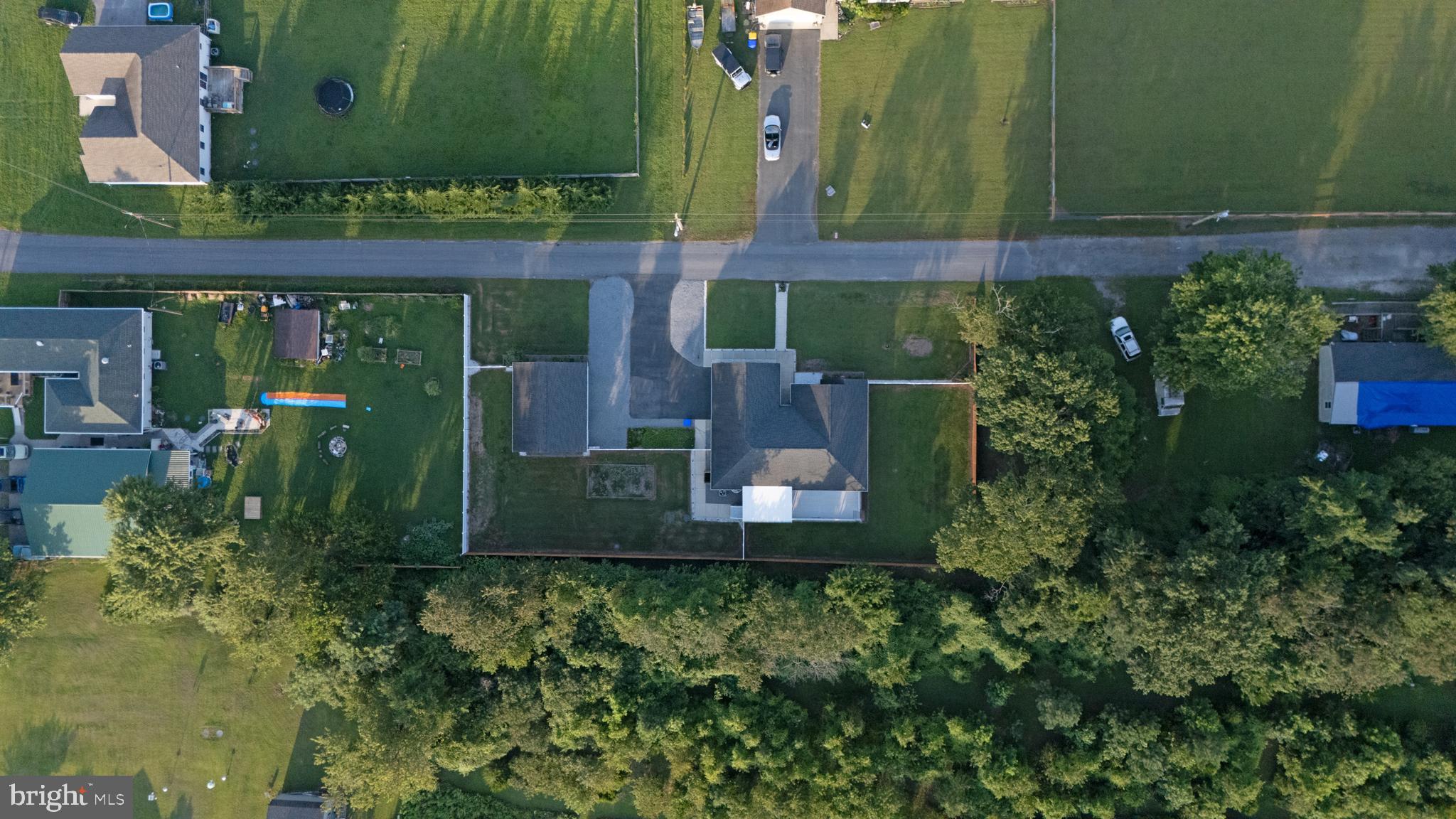 54 Minner Street Houston, DE 19954 - Photo 17 of 55 an aerial view of a house with a yard